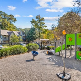 a playground with a fence