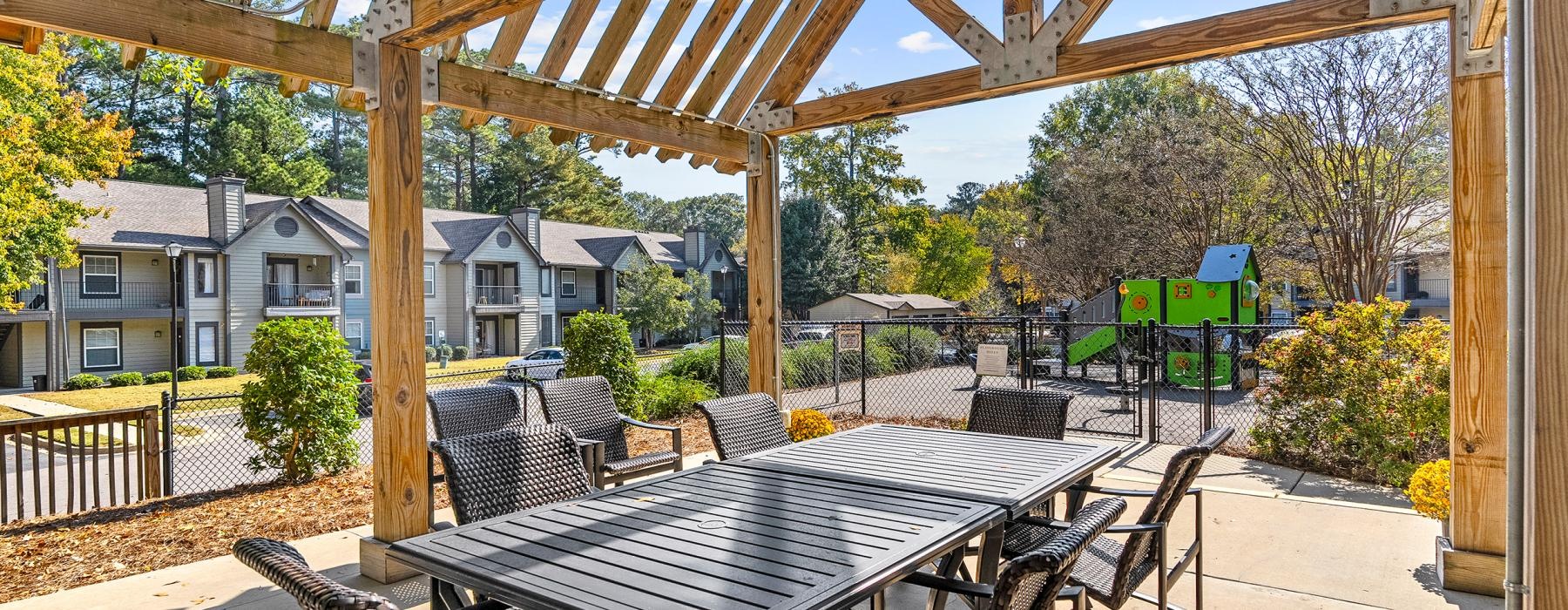 a table and chairs on a patio